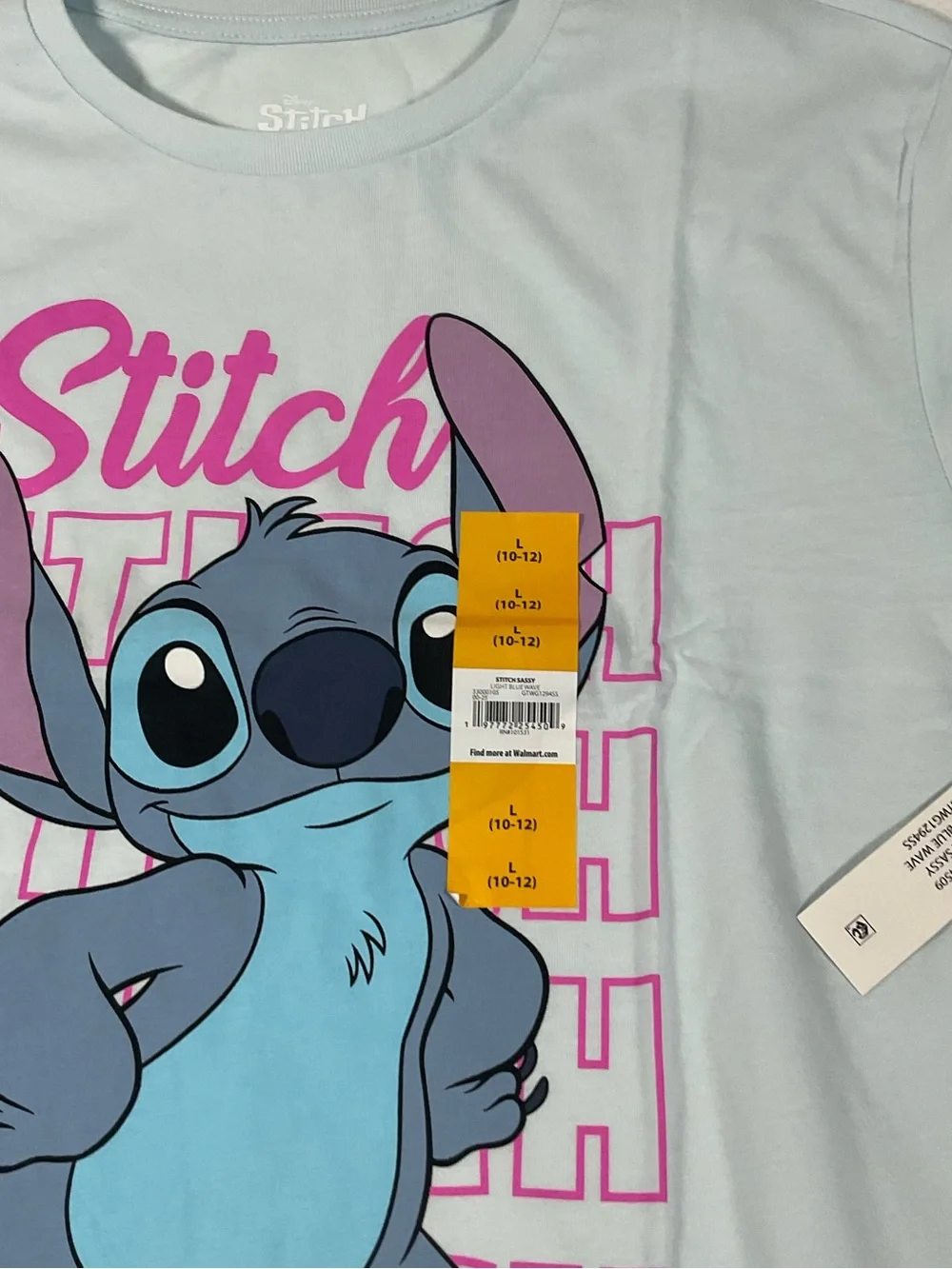 Disney Light Blue Stitch Tee with Pink and Purple. New with Tag.size L(10/12)